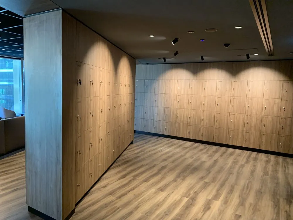 Warm timber joinery and integrated lockers in a commercial interior
